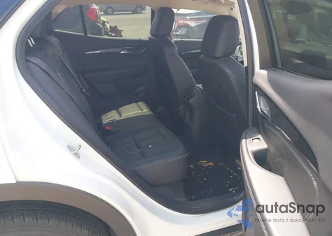 2023 Buick Envision Essence Fwd z USA, uszkodzony, nr VIN LRBFZNR47PD127851